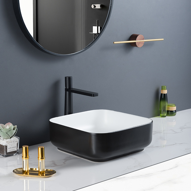 Lavabo de baño moderno de cerámica negra con montaje superior