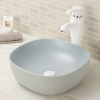 Lavabo de baño de porcelana vítrea sin rebosadero